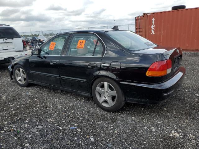 Photo 1 VIN: 2HGEJ6671VH516818 - HONDA CIVIC LX 