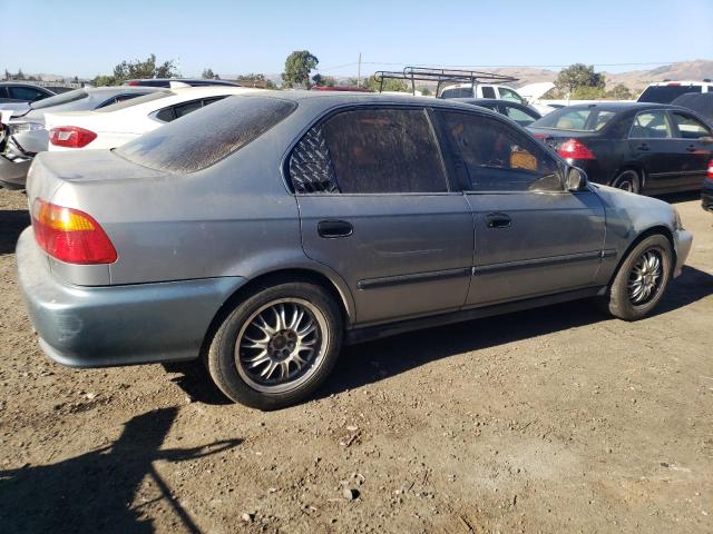 Photo 2 VIN: 2HGEJ6671XH569876 - HONDA CIVIC LX 