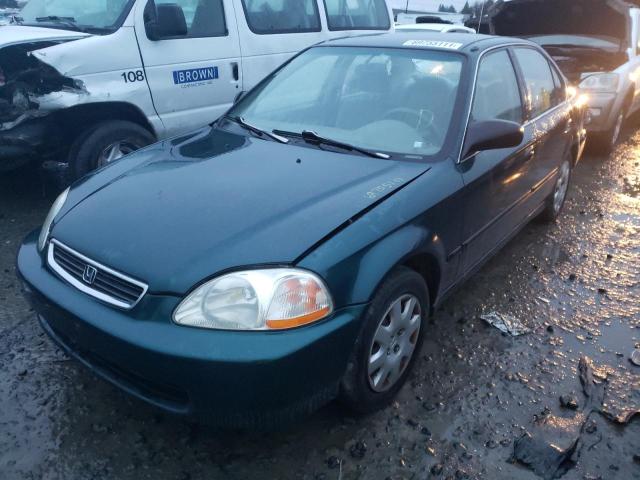 Photo 1 VIN: 2HGEJ6672WH612409 - HONDA CIVIC LX 