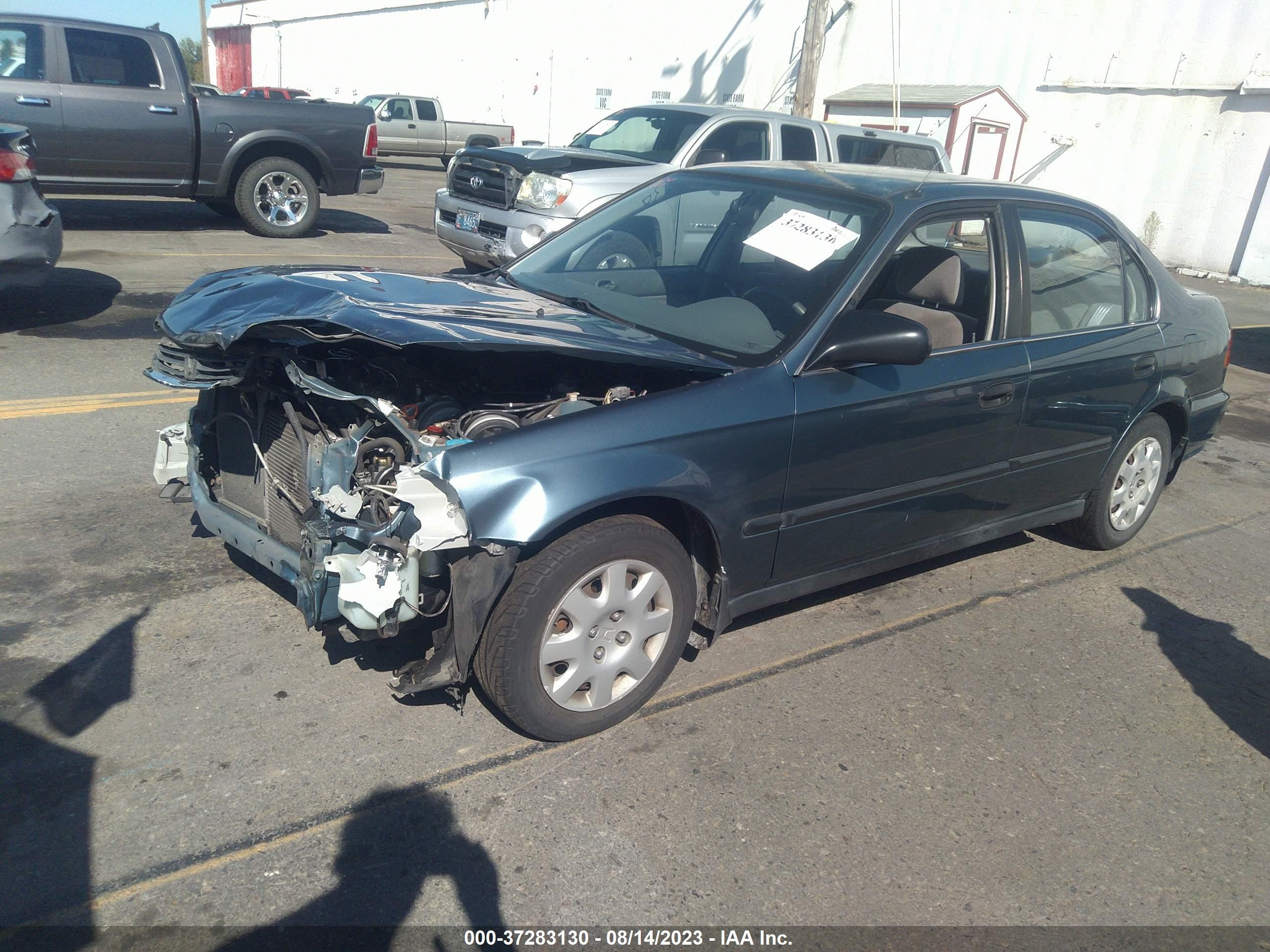 Photo 1 VIN: 2HGEJ6673WH628117 - HONDA CIVIC 