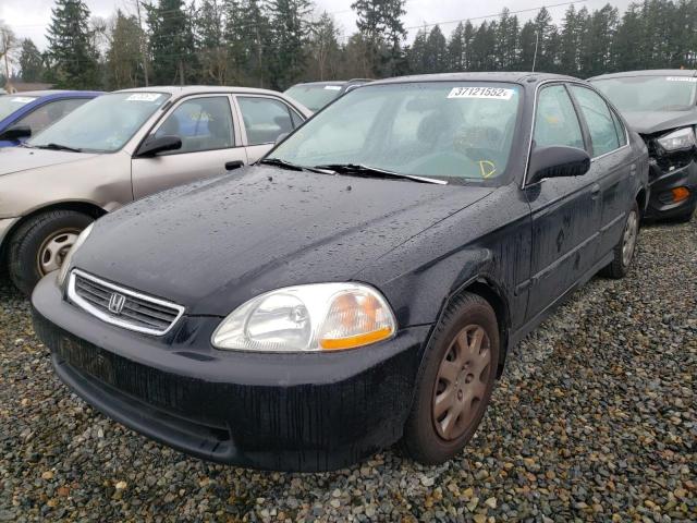 Photo 1 VIN: 2HGEJ6676WH522602 - HONDA CIVIC LX 