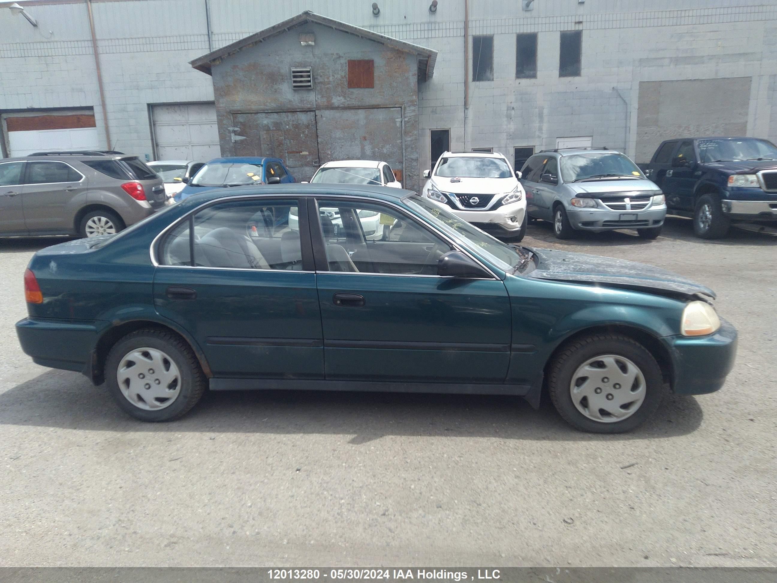 Photo 10 VIN: 2HGEJ6684VH915375 - HONDA CIVIC 