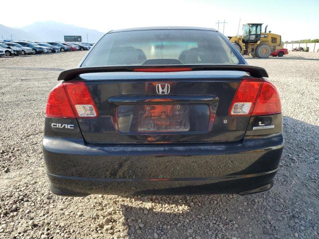 Photo 5 VIN: 2HGES15515H573729 - HONDA CIVIC LX 