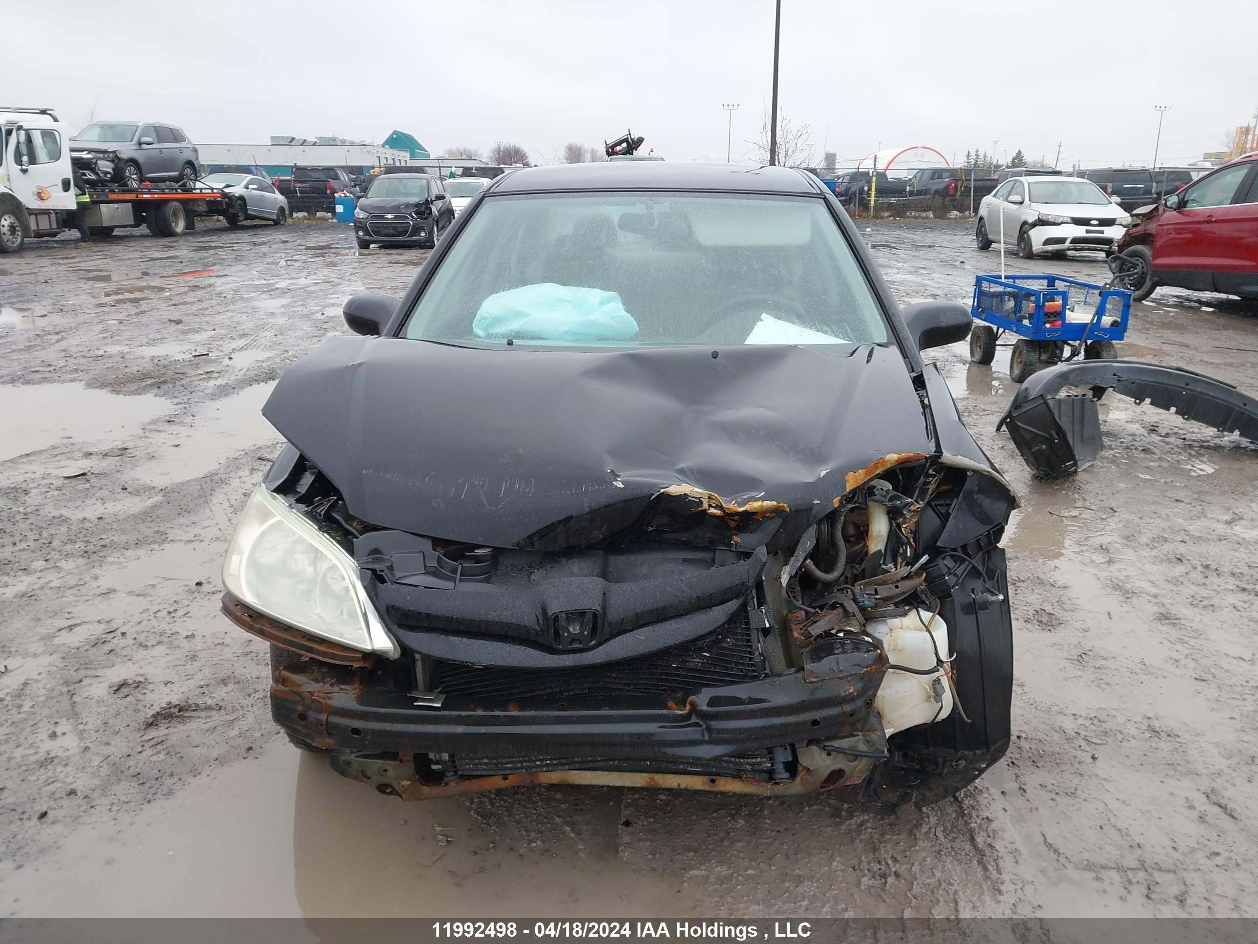 Photo 12 VIN: 2HGES16324H926975 - HONDA CIVIC 