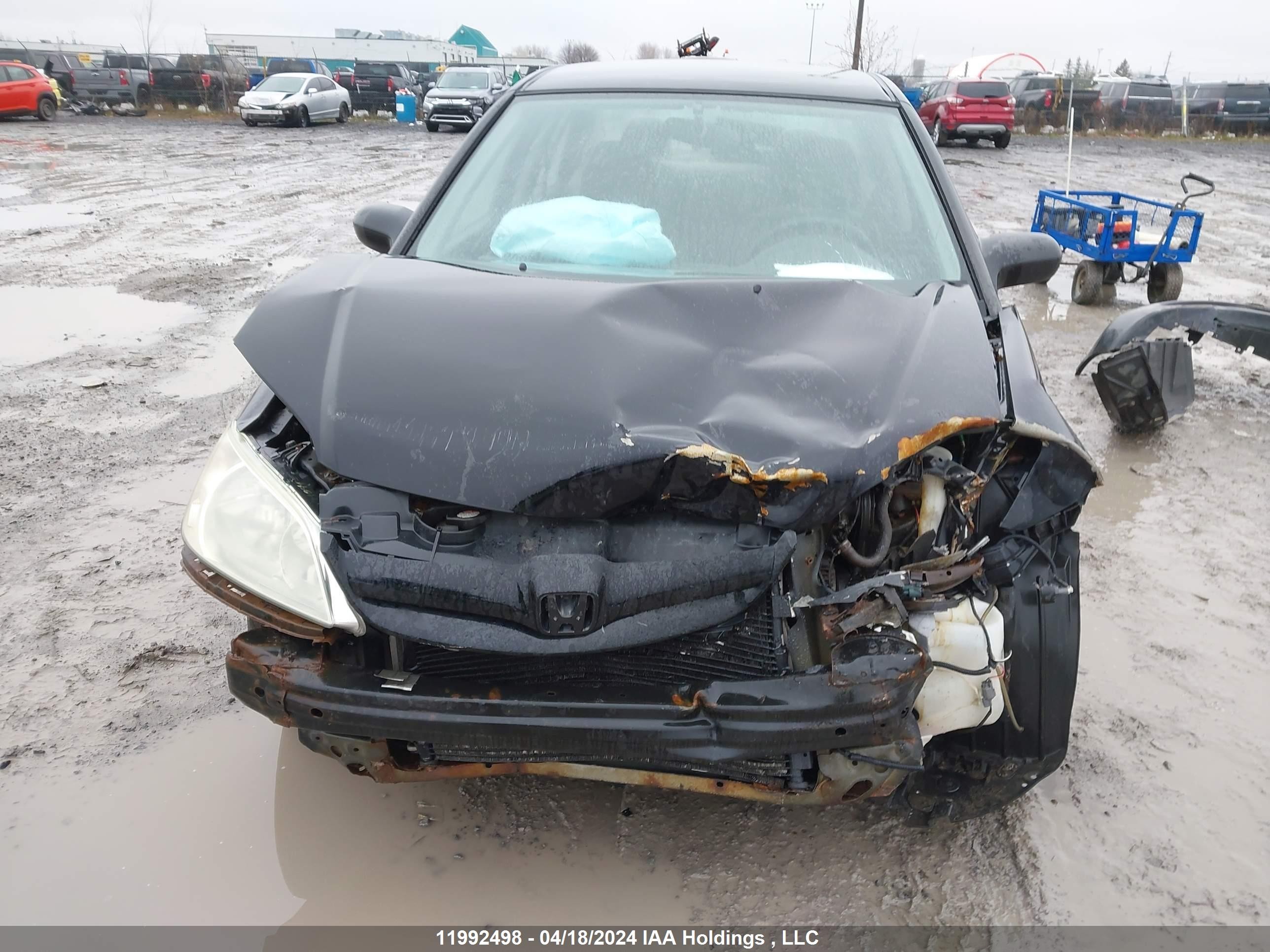 Photo 5 VIN: 2HGES16324H926975 - HONDA CIVIC 