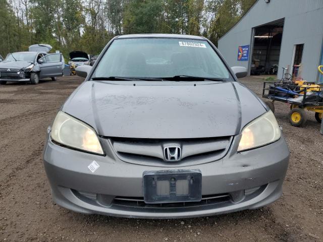 Photo 4 VIN: 2HGES16674H909633 - HONDA CIVIC LX 