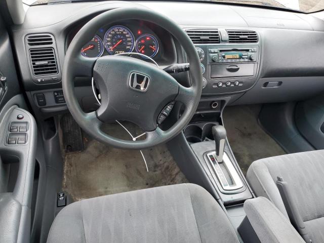 Photo 7 VIN: 2HGES16674H909633 - HONDA CIVIC LX 