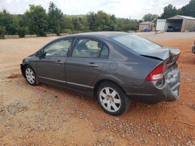 Photo 1 VIN: 2HGFA1F50AH320899 - HONDA CIVIC LX 