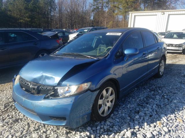 Photo 1 VIN: 2HGFA1F50AH321891 - HONDA CIVIC LX 