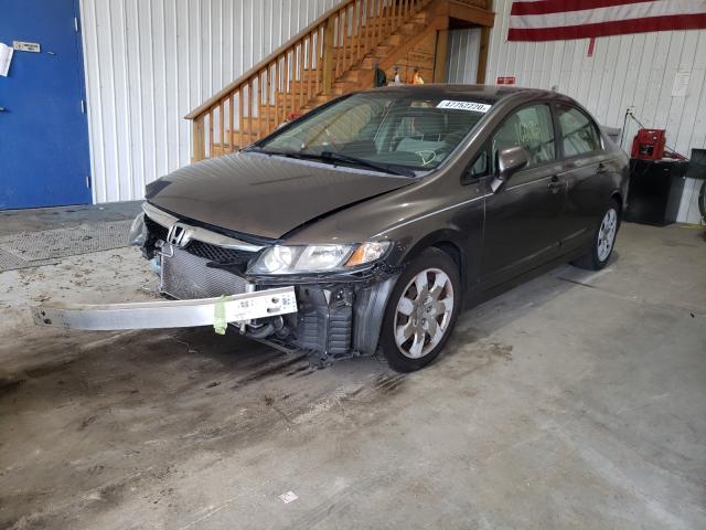 Photo 1 VIN: 2HGFA1F50AH523582 - HONDA CIVIC LX 