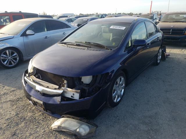 Photo 1 VIN: 2HGFA1F50AH533304 - HONDA CIVIC LX 