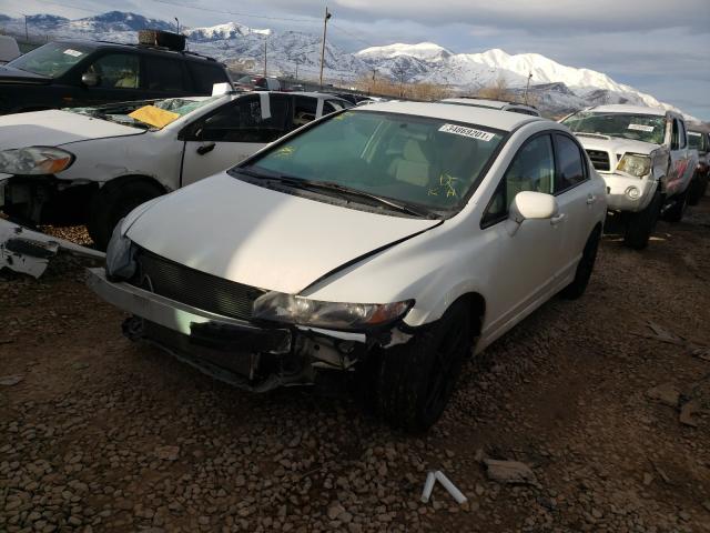 Photo 1 VIN: 2HGFA1F50AH537711 - HONDA CIVIC LX 