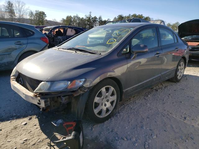 Photo 1 VIN: 2HGFA1F50AH561877 - HONDA CIVIC LX 