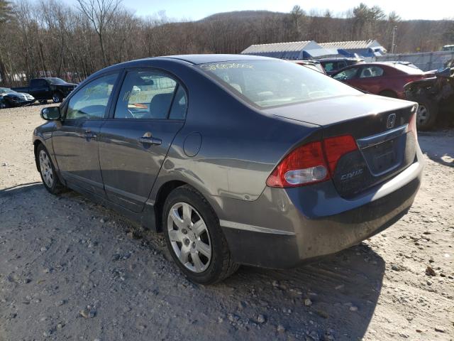 Photo 2 VIN: 2HGFA1F50AH561877 - HONDA CIVIC LX 