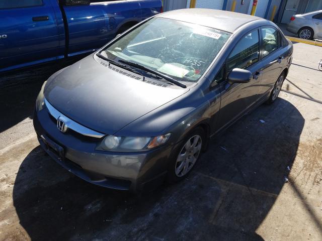 Photo 1 VIN: 2HGFA1F51AH304114 - HONDA CIVIC LX 