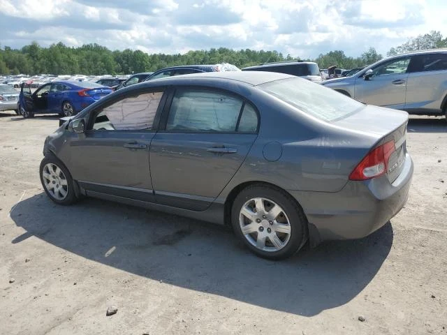 Photo 1 VIN: 2HGFA1F51AH307272 - HONDA CIVIC LX 