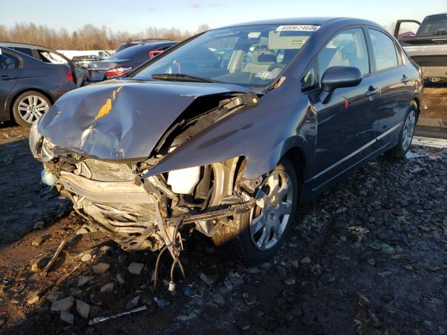 Photo 1 VIN: 2HGFA1F51AH317428 - HONDA CIVIC LX 