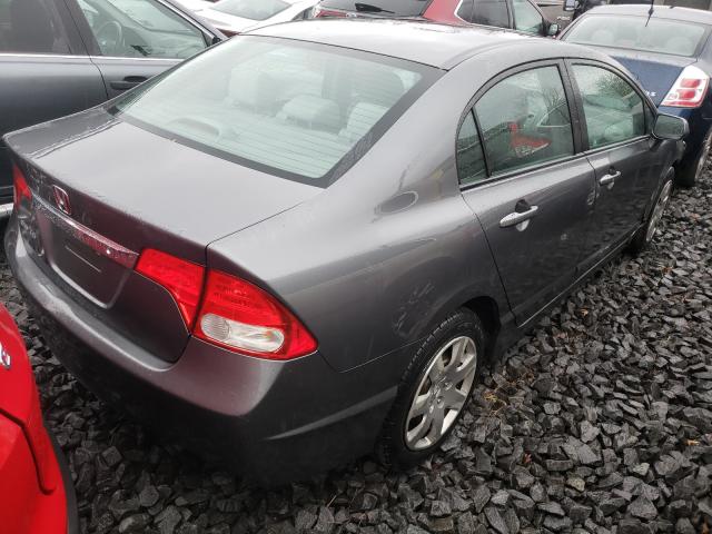 Photo 3 VIN: 2HGFA1F51AH317428 - HONDA CIVIC LX 