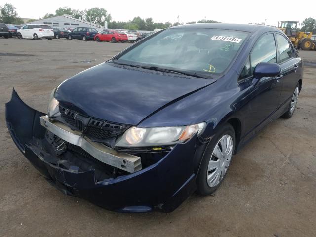 Photo 1 VIN: 2HGFA1F51AH562567 - HONDA CIVIC LX 