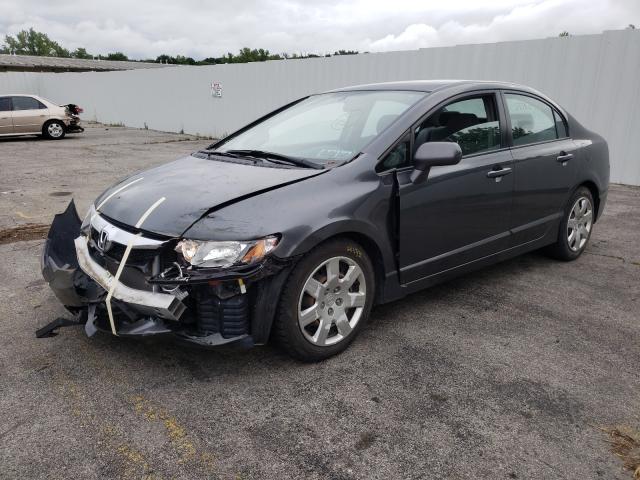 Photo 1 VIN: 2HGFA1F51AH569082 - HONDA CIVIC LX 