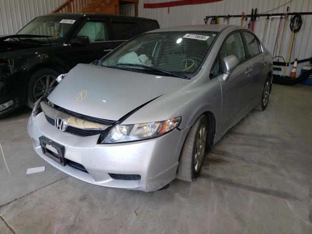 Photo 1 VIN: 2HGFA1F51AH570927 - HONDA CIVIC LX 