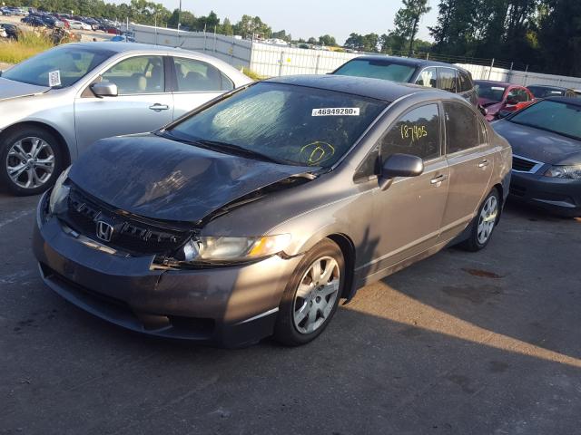 Photo 1 VIN: 2HGFA1F51AH575626 - HONDA CIVIC LX 