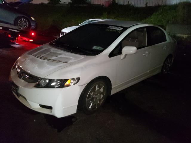 Photo 1 VIN: 2HGFA1F51AH586688 - HONDA CIVIC LX 