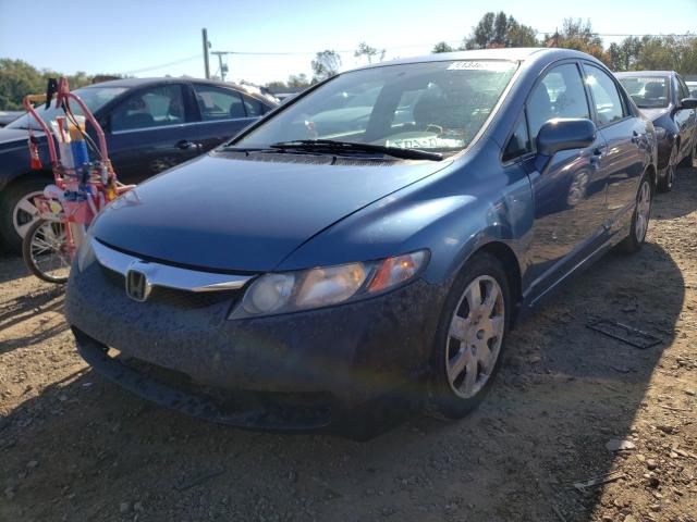 Photo 1 VIN: 2HGFA1F51BH529165 - HONDA CIVIC LX 