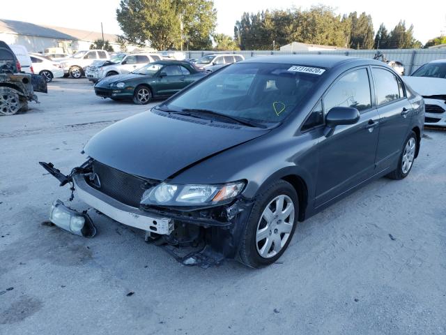 Photo 1 VIN: 2HGFA1F52AH301044 - HONDA CIVIC LX 