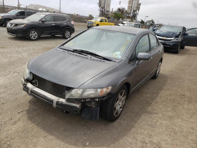 Photo 1 VIN: 2HGFA1F52AH527245 - HONDA CIVIC LX 