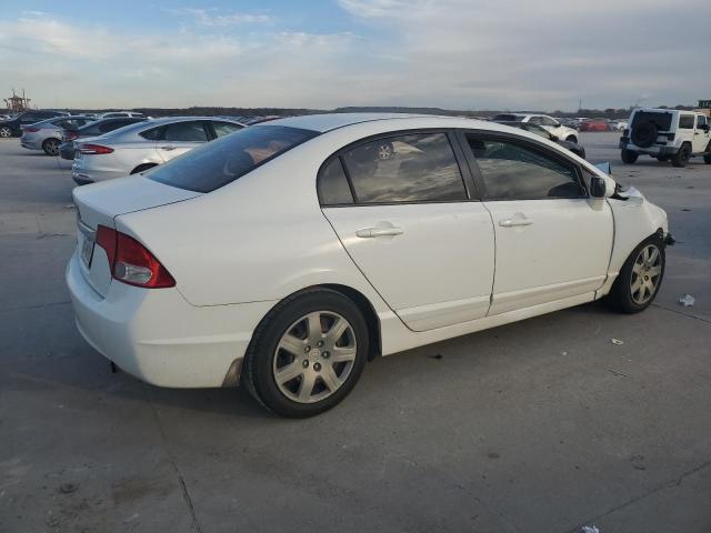 Photo 2 VIN: 2HGFA1F52AH530243 - HONDA CIVIC LX 