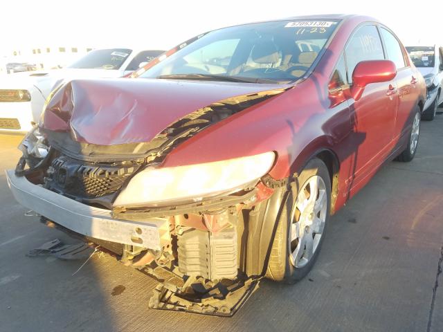 Photo 1 VIN: 2HGFA1F52AH532140 - HONDA CIVIC LX 