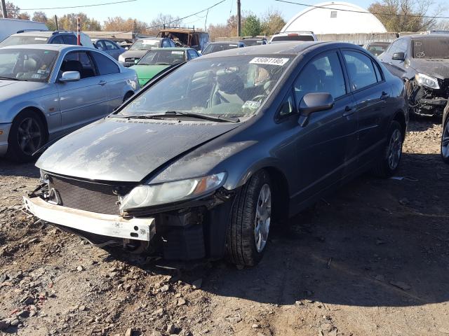 Photo 1 VIN: 2HGFA1F52AH534809 - HONDA CIVIC LX 