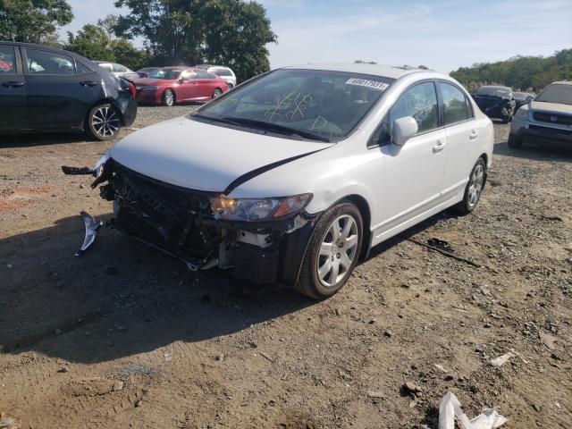 Photo 1 VIN: 2HGFA1F52AH540027 - HONDA CIVIC LX 