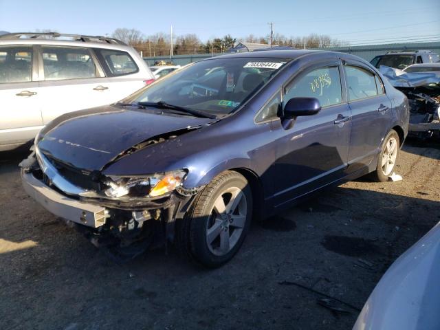 Photo 1 VIN: 2HGFA1F52AH551688 - HONDA CIVIC LX 