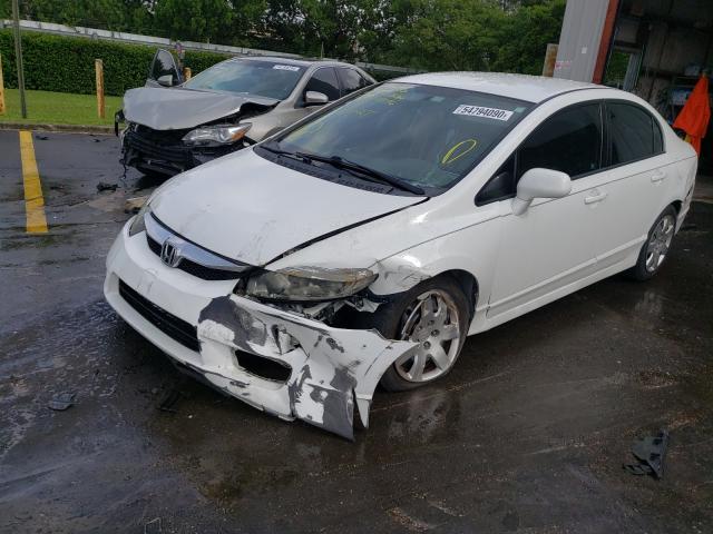 Photo 1 VIN: 2HGFA1F52AH560424 - HONDA CIVIC LX 