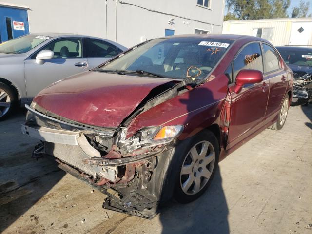 Photo 1 VIN: 2HGFA1F52AH561850 - HONDA CIVIC LX 