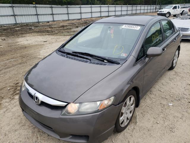 Photo 1 VIN: 2HGFA1F52AH563257 - HONDA CIVIC LX 