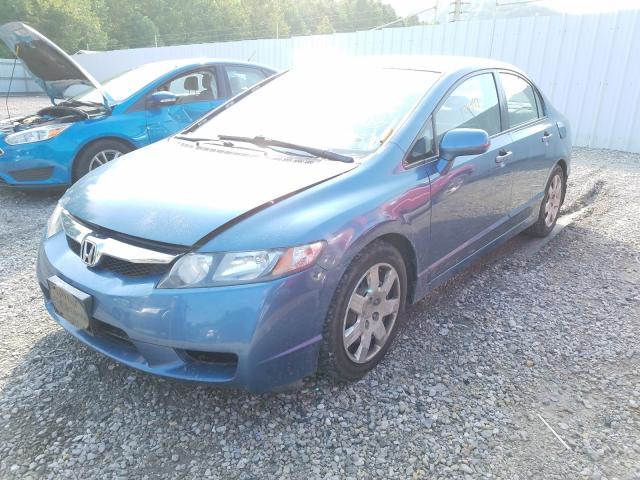 Photo 1 VIN: 2HGFA1F52AH563761 - HONDA CIVIC LX 