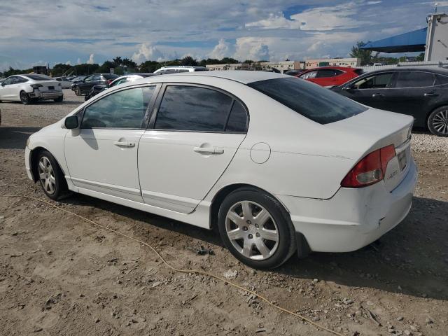 Photo 1 VIN: 2HGFA1F52AH572508 - HONDA CIVIC LX 