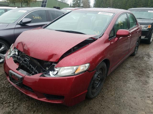 Photo 1 VIN: 2HGFA1F52AH574453 - HONDA CIVIC LX 