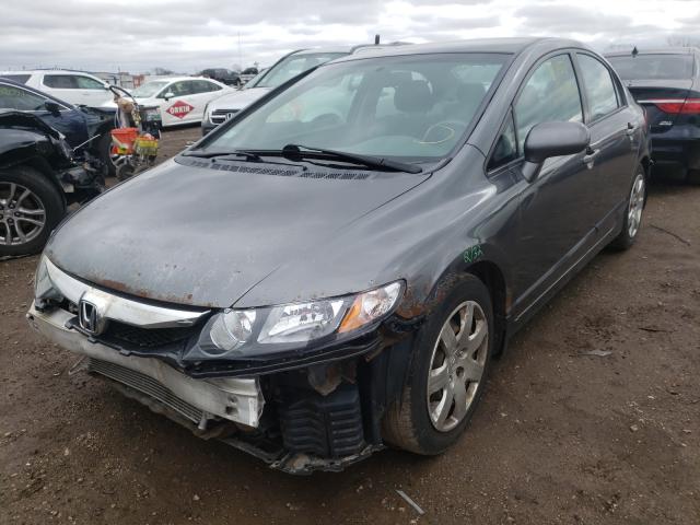 Photo 1 VIN: 2HGFA1F52AH575232 - HONDA CIVIC LX 