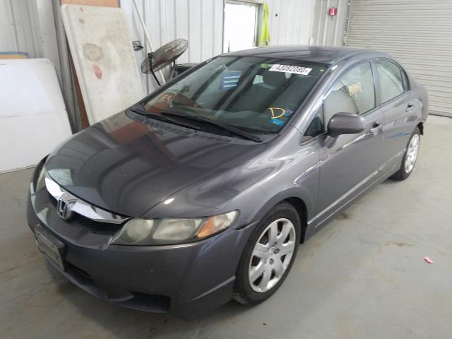 Photo 1 VIN: 2HGFA1F52AH578308 - HONDA CIVIC LX 