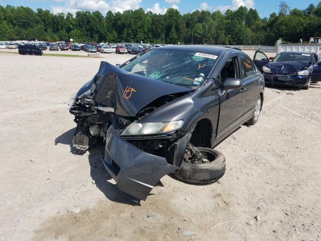 Photo 1 VIN: 2HGFA1F52AH579586 - HONDA CIVIC LX 