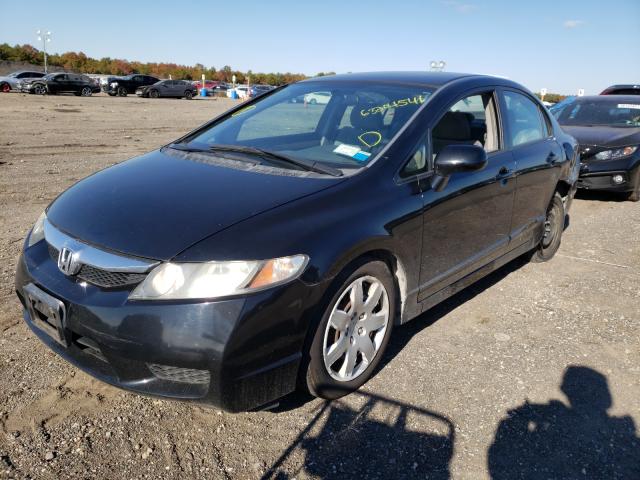 Photo 1 VIN: 2HGFA1F52BH304625 - HONDA CIVIC LX 