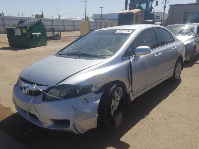 Photo 1 VIN: 2HGFA1F52BH534620 - HONDA CIVIC LX 