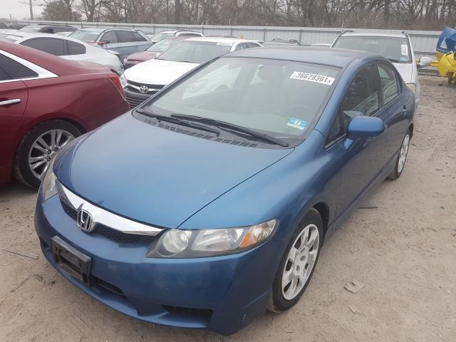 Photo 1 VIN: 2HGFA1F52BH543933 - HONDA CIVIC LX 