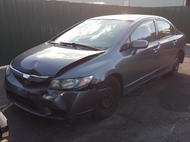 Photo 1 VIN: 2HGFA1F53AH306561 - HONDA CIVIC LX 