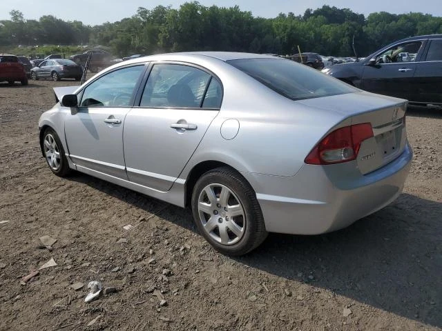 Photo 1 VIN: 2HGFA1F53AH306687 - HONDA CIVIC LX 