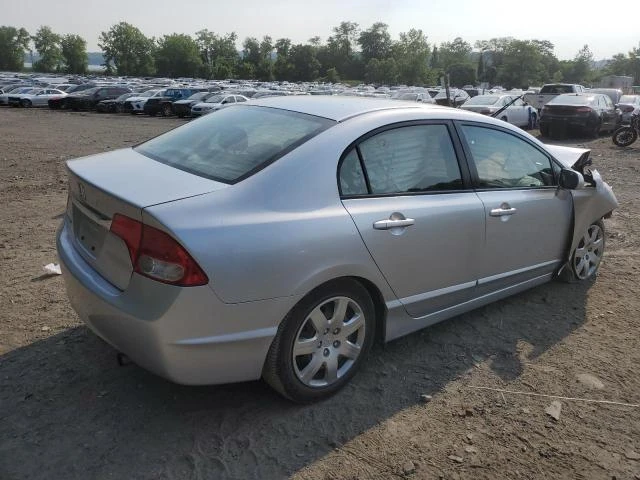 Photo 2 VIN: 2HGFA1F53AH306687 - HONDA CIVIC LX 